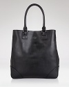 Tall and elegant, this luxe Saffiano leather magazine tote boasts enviable style.