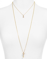 Unlock sweet yet simple style with this layered charm necklace from Juicy Couture.
