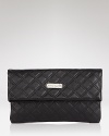 Marc Jacobs mixes sophistication with cool-girl allure. This leather clutch encapsulates the look with a night-right shape and tactile, quilted design.