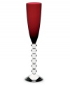 Color it chic. Baccarat takes already-stunning Vega stemware to the next level with this ruby-tinted flute. A chunky, beaded stem contrasts brilliant color in heavy, exquisitely crafted crystal.