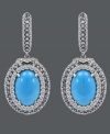 Tantalize the senses with this tasteful style. Carlo Viani's delightfully dramatic drop earrings feature oval-cut turquoise (8 mm) surrounded by rings of round-cut blue topaz (1-1/3 ct. t.w.) and white sapphire (2-1/2 ct. t.w.). Crafted in 14k white gold. Approximate drop: 1-1/2 inches.