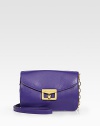 EXCLUSIVELY AT SAKS in Royal Purple. Smooth leather crafted in a petite flap silhouette, finished with a versatile leather and chain shoulder strap.Detachable shoulder strap, 22 dropTurnlock flap closureSix inside card slotsFully lined7½W X 4H X 1½DImported