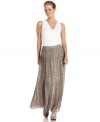 A snakeskin print and pleats create a chic effect on MICHAEL Michael Kors' petite maxi skirt. Pair this on-trend piece with a basic top to maximize your look!