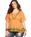 Featuring a scarf print, American Rag's short sleeve plus size top is must-get for the season!