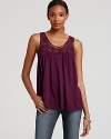 A crochet inset at the neckline lends eclecticism to this richly hued Michael Stars tank.