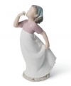 A young girl welcomes the first scent of spring in this charming handmade porcelain figure from Lladró.