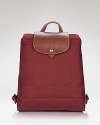 Get on-trend style with this versatile leather-trimmed backpack from Longchamp. Folds for easy packing.