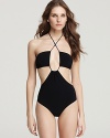Take boldness to the beach with this audacious Burberry Brit monokini--a skin-flaunting suit that's balanced by a classic black hue.