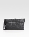 This supple, pebbled leather design is accented with a woven leather trim and wristlet strap.Wristlet strap, 5½ dropTop zip closureSuede lining11W X 6½H X ¾DMade in Italy