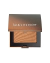 Laura Mercier Bronzed Pressed Powder is a silky smooth bronzing powder that glides on evenly, giving the skin a soft luminosity and healthy, sunny glow without looking unnatural or heavy. The velvet composition adheres to the skin providing longer wear while special pigments blend evenly into the skin. Oil-free, mistake-proof application provides the perfect back to beach look.