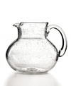Simply stylish, this Iris pitcher makes a splash in any setting with tiny bubbles trapped in dishwasher-safe glass. From Artland's serveware collection.