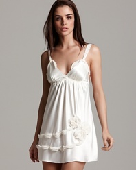 Feel ultra-feminine in this chiffon chemise featuring a chain and rosette detail on the hem.