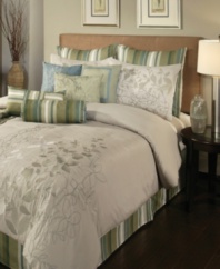 Fresh florals. An embroidered and printed floral motif adorns these Arcadia comforter sets in soothing tan, green and blue hues. Set is accented with striped European shams and bedskirt. Five distinctive decorative pillows complete this relaxing oasis.