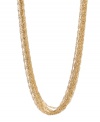 Make a style statement in luxurious layers. Kenneth Cole New York necklace features ten strands of long, gold tone mixed metal chains. Approximate length: 32 inches + 3-inch extender.