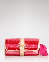 Turn on the glitz with Juicy Couture's sequin-splashed clutch, boasting stripes and a grosgrain bow. In glamourous style, this nighttime bag screams girlie-girl.