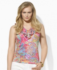 Drawing inspiration from warm-weather destinations with a bright and breezy paisley print, this plus size Lauren by Ralph Lauren top is crafted from lightweight tissue cotton with a soft cascade of ruffles.