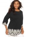 A border print illuminates Charter Club's three-quarter-sleeve plus size tunic top for a chic casual look.