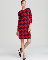 Embolden your fall workweek wardrobe with this boldly printed DIANE von FURSTENBERG sweater dress--extra-chic layered with opaque tights.