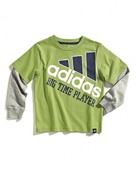 Designed by Adidas for the aspiring athlete, this lightweight 2fer completes your big time player's sporty look.