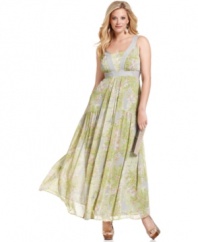 Jessica Simpson's garden-party-inspired, plus size maxi dress features a sheer, floral-print overlay and a contrasting empire waistband that puts a flattering emphasis on the silhouette.