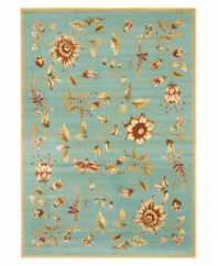 An intricate display of cascading florals creates this purely elegant Lyndhurst area rug from Safavieh. Crafted in Turkey of soft polypropylene, this rug radiates timeless allure with the added convenience of easy-care construction. (Clearance)