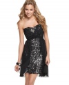 Glimmer like a starry night in this dress from Trixxi where infinite sequins wink underneath a delicate chiffon overlay.