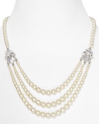 Classic pearls make a modern statement on this triple strand necklace from Carolee, featuring a layered look that instantly dresses up every neckline.