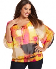 Capture a striking bohemian spirit with Alfani's three-quarter-sleeve plus size peasant top, featuring an abstract print.