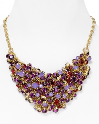 There's nothing quiet about this clustered bib necklace from Aqua with flaunts a chic cluster of multi colored crystals and stones. Turn up the volume.