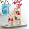 Hand-painted floral tableau on hand-blown glass.