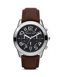 Borrow from the boys with this handsome leather-strapped watch from MICHAEL Michael Kors. It's bold dial and oversized face are the perfect foil for feminine looks.
