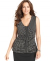 Get spotted in Alfani's sleeveless plus size top, featuring a polka-dot print.
