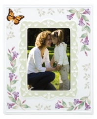 Spring is perpetually in season with whimsical Butterfly Meadow giftware. Colorful blooms and a playful butterfly mingle on this white porcelain picture frame, creating an extra-sweet scene for precious memories.