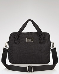 Tote your laptop in style with this logo-stitched laptop case from MARC BY MARC JACOBS.