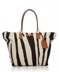 Available in giraffe, leopard and zebra patterns - and a solid sand hue - this safari-chic tote from Dooney & Bourke is an earthy, elegant option for everyday errands.