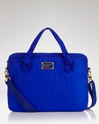 Tote your laptop in style with this chic laptop case from MARC BY MARC JACOBS.