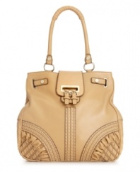 This unique style from Jessica Simpson is guaranteed to turn a few heads. Heavy stitching, rouched detailing and shiny gold-tone accents add polished appeal to this classic tote design.
