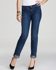 A rolled-up hem lends fresh style to these Citizens of Humanity straight-leg jeans, imbued with a medium-blue inky wash.