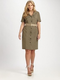 Inspired by the classic trenchcoat, this crisp, stretch cotton dress features timeless-yet-unexpected details like gunflaps.Collar neckThree-quarter sleevesGunflapsButton frontBelt includedFront pocketsRainflapPull-on styleAbout 25 from natural waist72% cotton/23% polyamide/5% Lycra®Machine washImported of Italian fabric