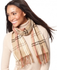 Ace cold weather accessorizing with this preppy plaid scarf in a soft knit by Cejon.