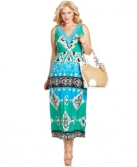 Get a sizzling look for summer with Style&co.'s sleeveless plus size maxi dress, highlighted by a vivid print.