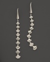 Brilliant diamonds accent abstract fishscales in India Hicks' sterling silver drop earrings.