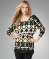 A vibrant print and a chic blouson-style fit make this Style&co. top a charismatic addition to your closet! (Clearance)