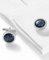 Soften up your sharp tailored look with these cufflinks infused with deep blue carbon.